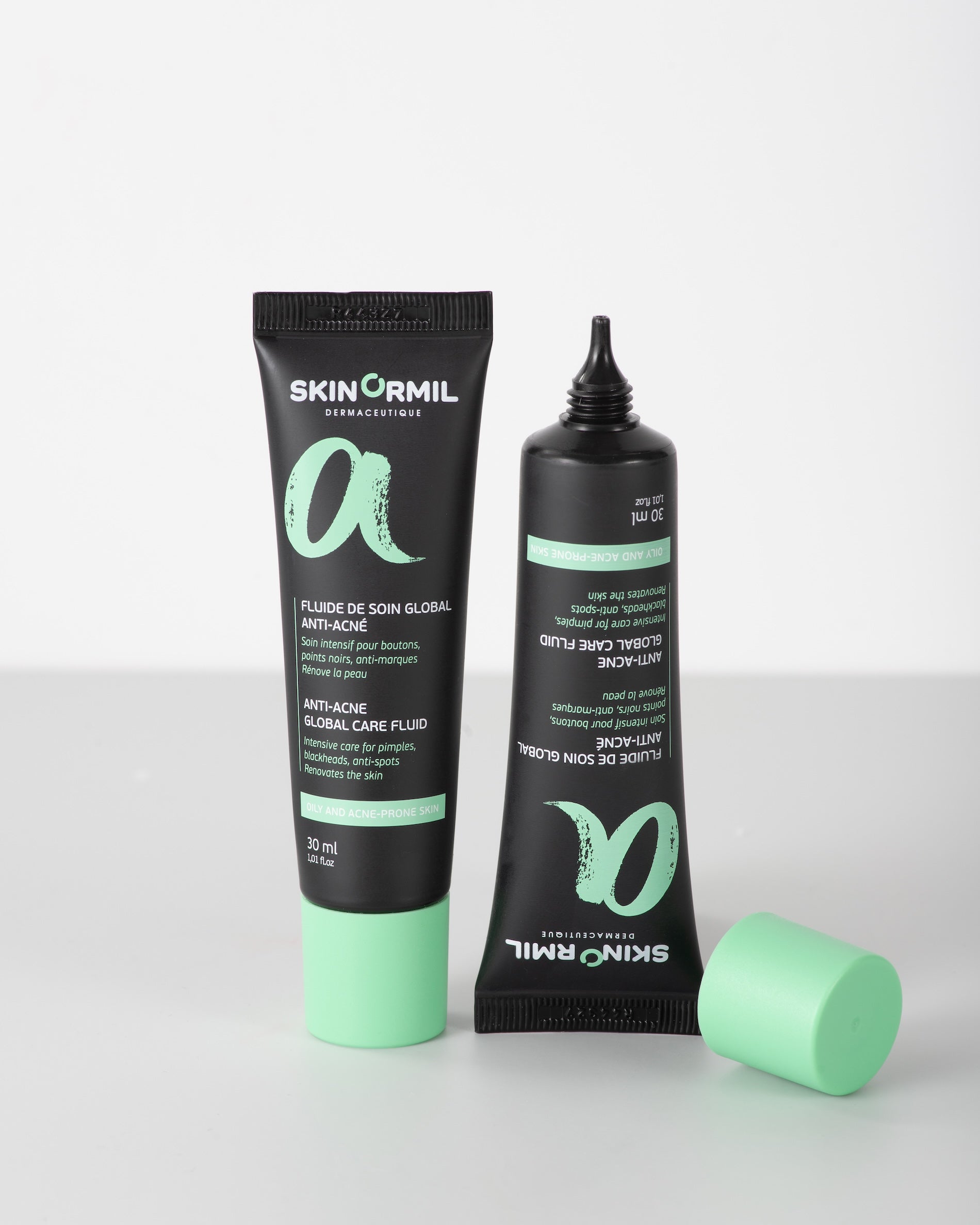 Fluide de soin global anti-acné