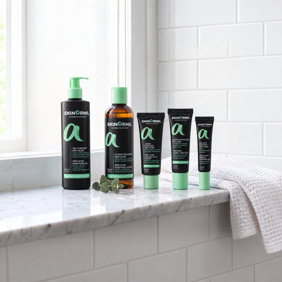 Skinormil Anti-Acne Complete Routine: 400 ml purifying gel, purifying lotion, skin balance cream, global care fluid and pimple stopper gel on a bathroom windowsill