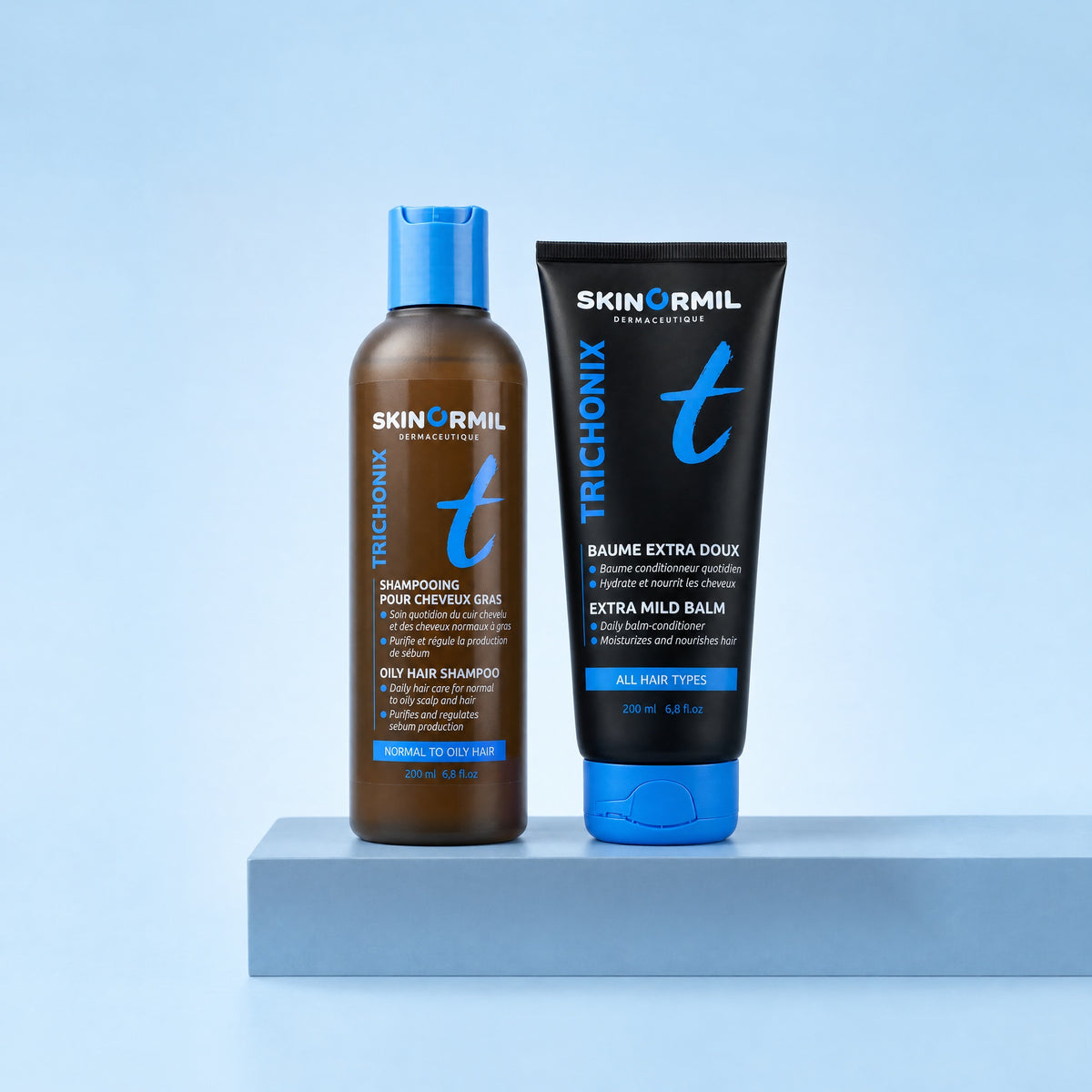 Skinormil Trichonix oily hair balance and softness duo on a soft backdrop