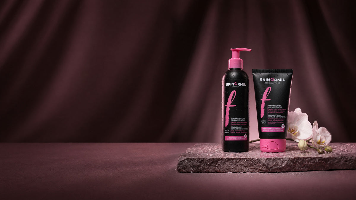 Skinormil Femina Daily 250 ml and Femina Extreme 100 ml intimate care on a mauve stone